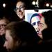 Supporters get their picture taken with an image of President Obama after he is elected to a second term on Tuesday. Daniel Brenner I AnnArbor.com